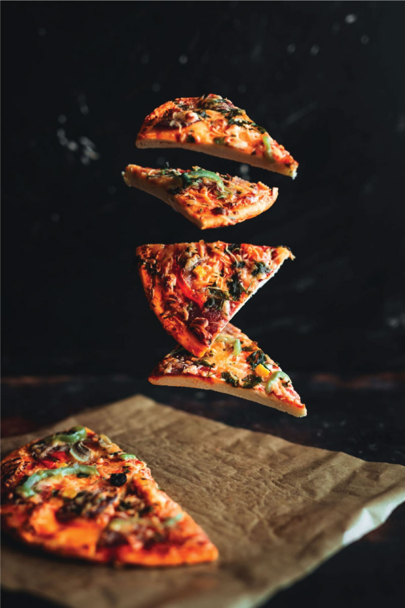  Levitation pizza on black background